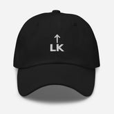 Corner cap jnjdjdnbjnddbnksckn featuring flat LK embroidery on a black six-panel design.