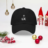 corner cap jnjdjdnbjnddbnksckn featuring LK embroidery, displayed with festive decorations and ornaments.