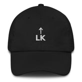 corner cap jnjdjdnbjnddbnksckn featuring arrow and LK embroidery on a classic black six-panel cap.