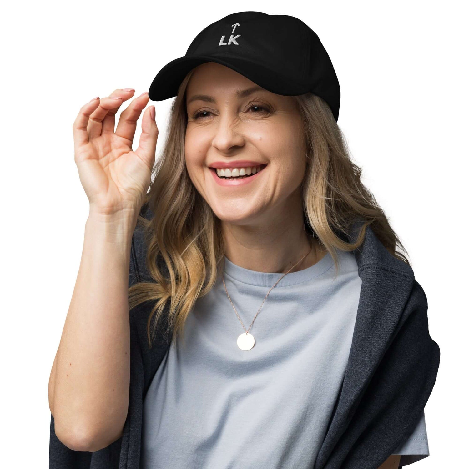 corner cap jnjdjdnbjnddbnksckn worn by a smiling woman, featuring a clean embroidered design on a black cap.